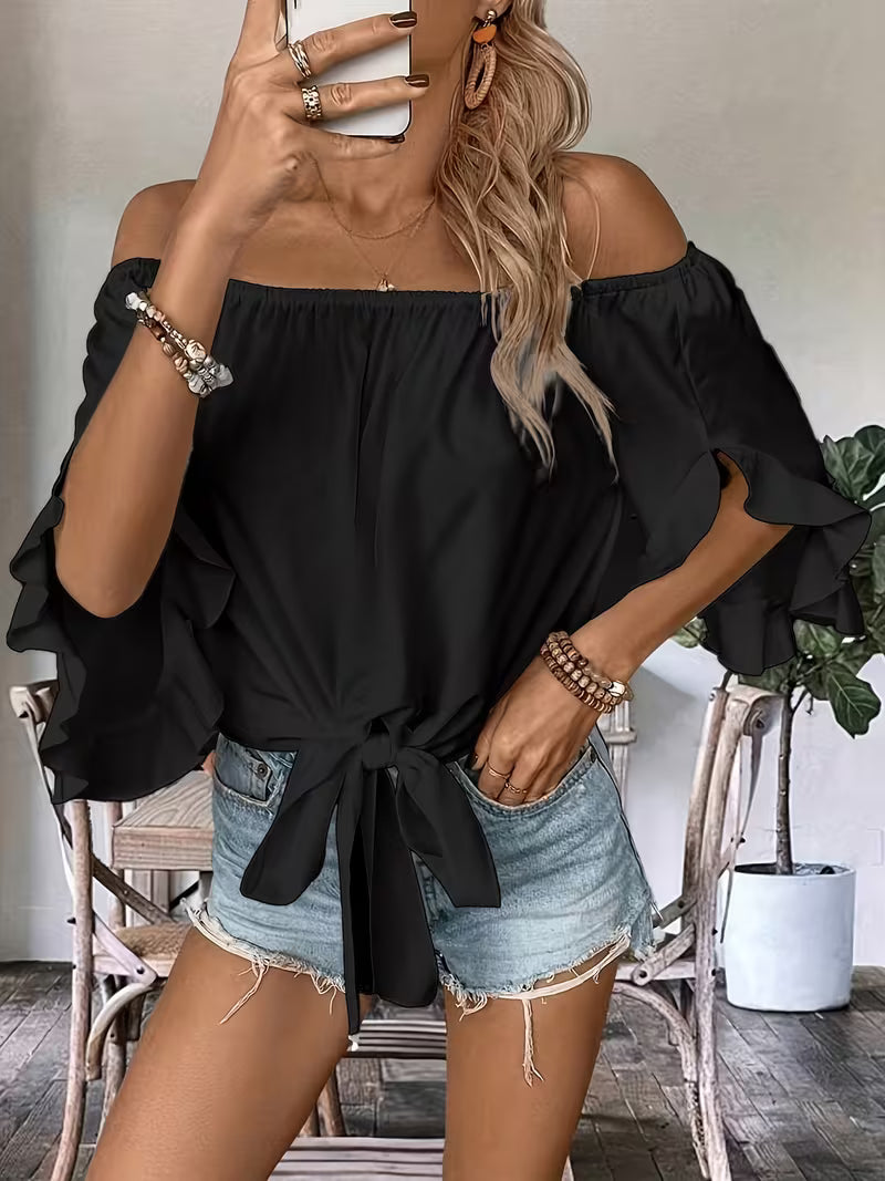 Top with open shoulders